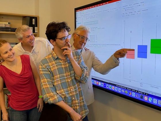 Researchers inspect the results