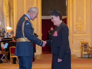 Terrie Moffitt Receives Royal Honor From the British Monarchy